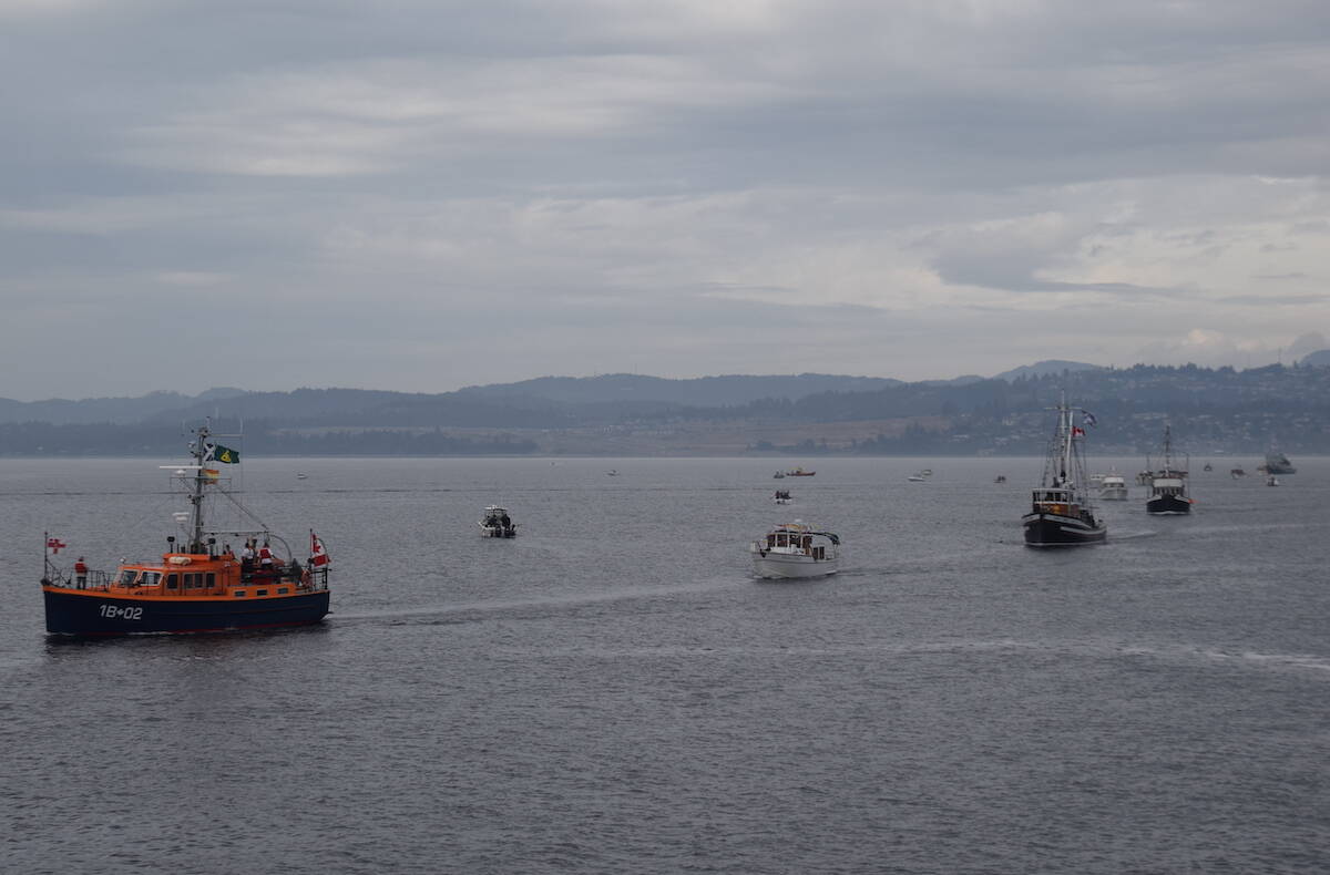 Classic boats sail past Ogden Point during the 44th Victoria Classic Boat Festival Sunday (Sept. 3). (Brendan Mayer/News Staff)