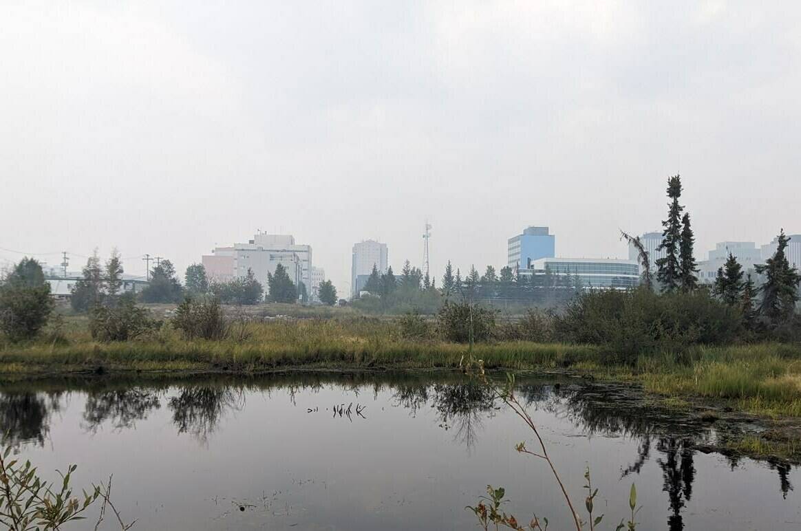 <div>Officials in Yellowknife, as well as staff with the Northwest Territories, are getting ready for the start of a mass migration home of wildfire evacuees that’s still on track for Wednesday. Wildfire smoke fills the air over Yellowknife, Thursday, Aug. 17, 2023. THE CANADIAN PRESS/Bill Braden</div>