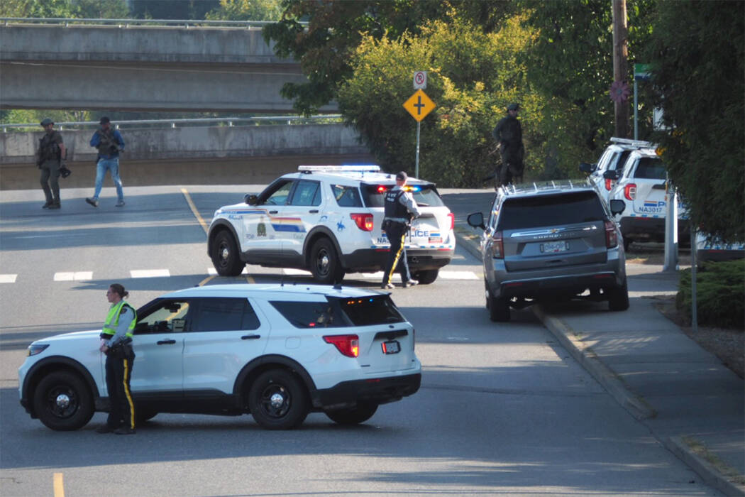 Nanaimo RCMP say a negotiator was called after a man in the Cranberry Road area, thought to have access to firearms, was believed to have locked himself inside a home. (Chris Bush/News Bulletin)