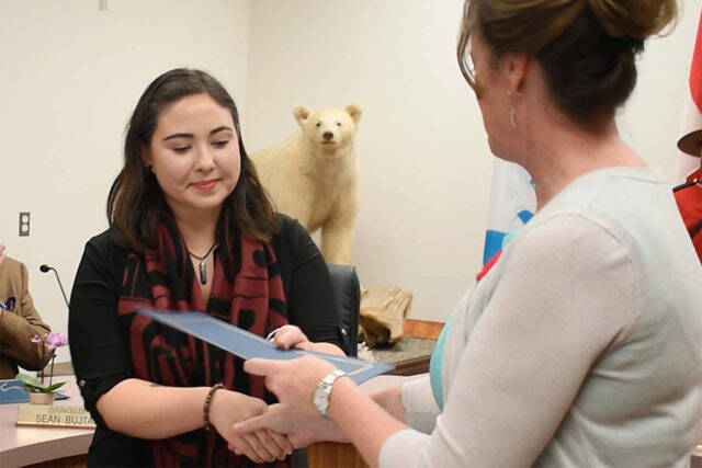 The City of Terrace has apologized to Jessica McCallum-Miller, shown here being sworn in as a city councillor in 2018, for what it terms “system racism” causing her to resign. (File photo)