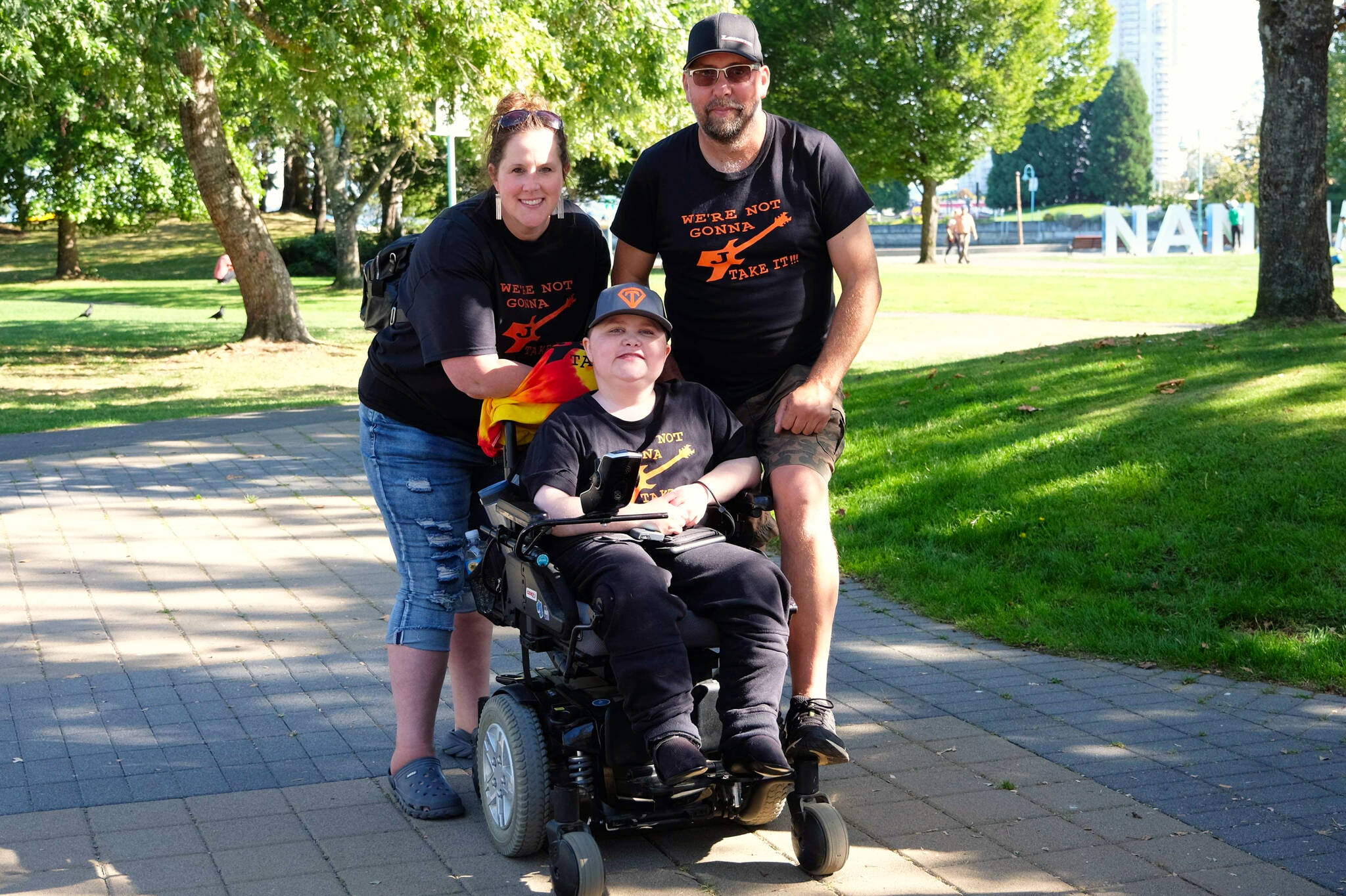 Jayden Hargreaves (middle), 18, is this year’s ambassador for the Vancouver Island Walk & Roll for MDC at Courtenay’s Airpark on Sept. 23. Photo courtesy of Denise Hargreaves