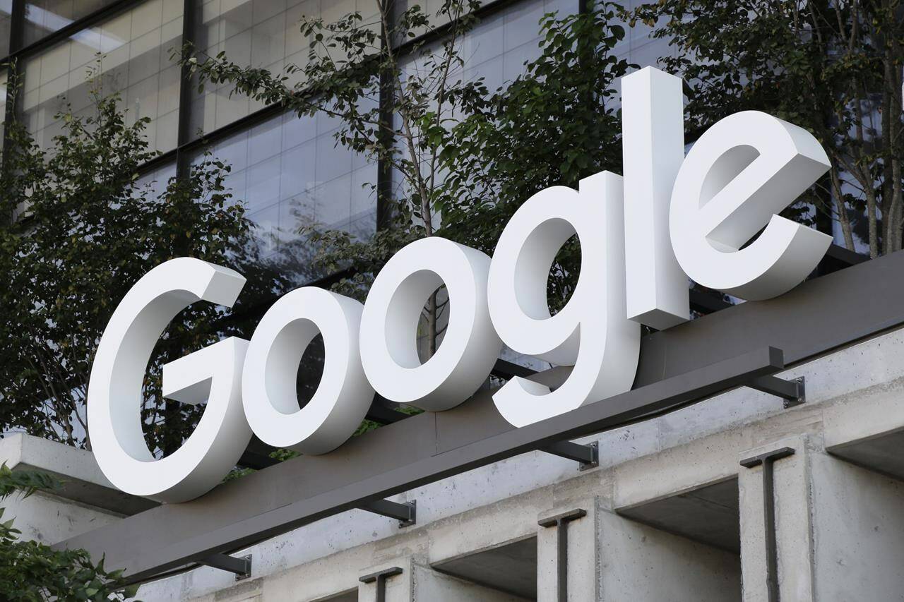 The Google sign is shown over an entrance to the company’s new building in New York on Wednesday, Sept. 6, 2023. The U.S. government is taking aim at what has been an indomitable empire: Google’s ubiquitous search engine and the lucrative digital services hatched by its unwavering status as the internet’s main gateway. (AP Photo/Peter Morgan)