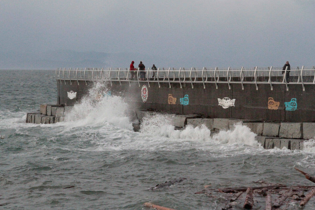 Spectators watch the waves at Ogden Point in Victoria during a wind storm. (Black Press Media file photo)