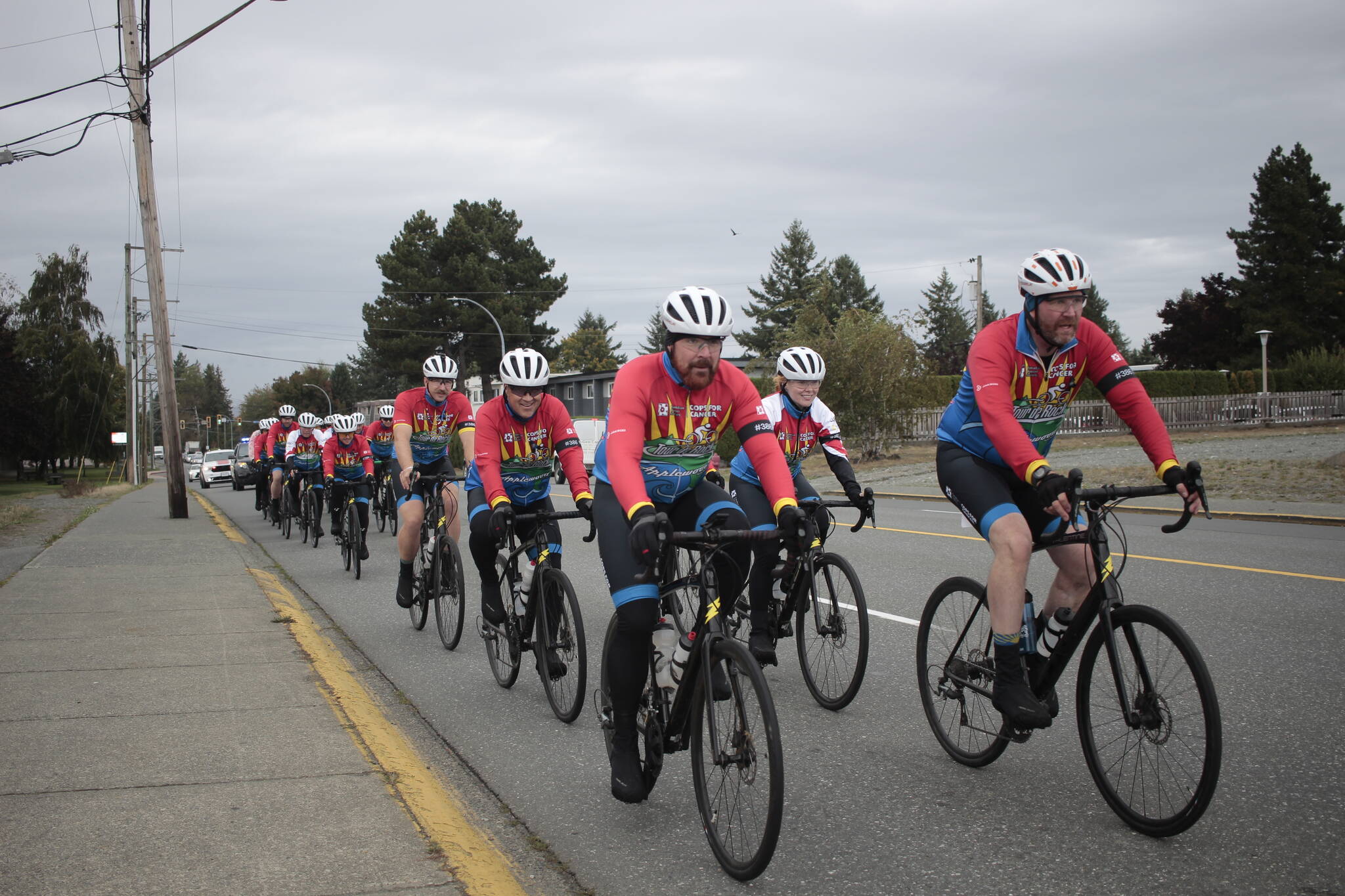 Tour de Rock riders cruise down Dogwood Street on Sept. 26. Photo by Marc Kitteringham/Campbell River Mirror