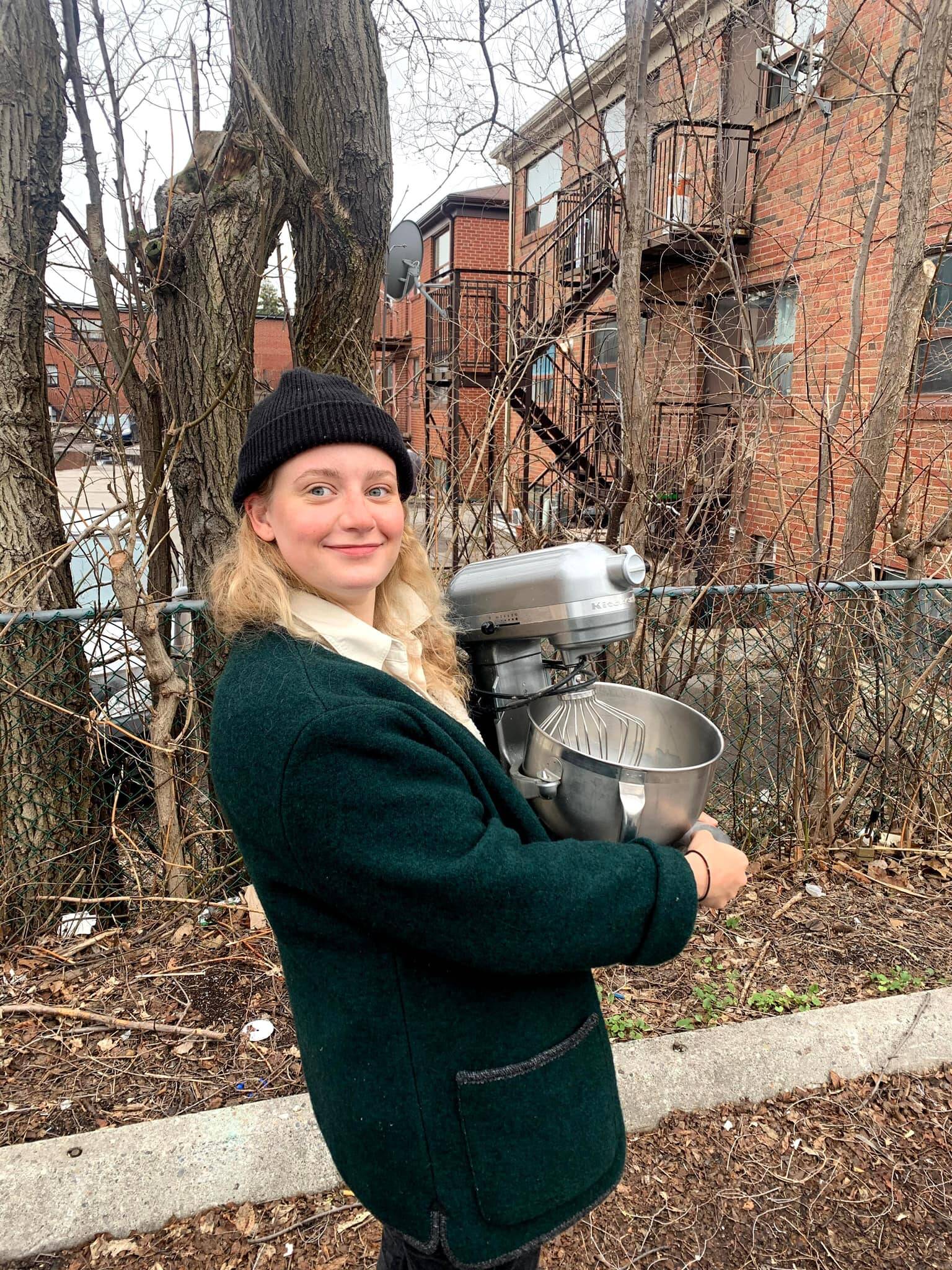 Kaitlyn Hundt-Lippett, pictured with her mixer Stanley. Hundt-Lippet is hoping someone driving to Nelson from Toronto will be able to bring her industrial kitchen mixer along in exchange for free baked goods. (Kaitlyn Alexandria Hundt-Lippett/Facebook)