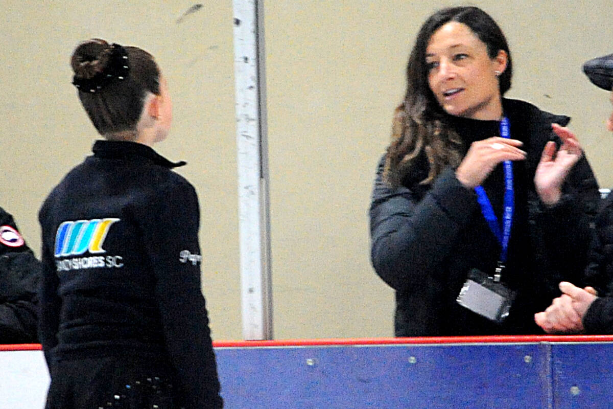 Sandy Shore Skating Club new head coach Kristen Avis gives Payton Hebb instructions prior to performing in the Star 4 Girls U13 competition at the BC/YT Super Series Fall Competition, held at Oceanside Place Sept. 22 to Sept. 24. Hebb finished in first place. (Michael Briones photo)
