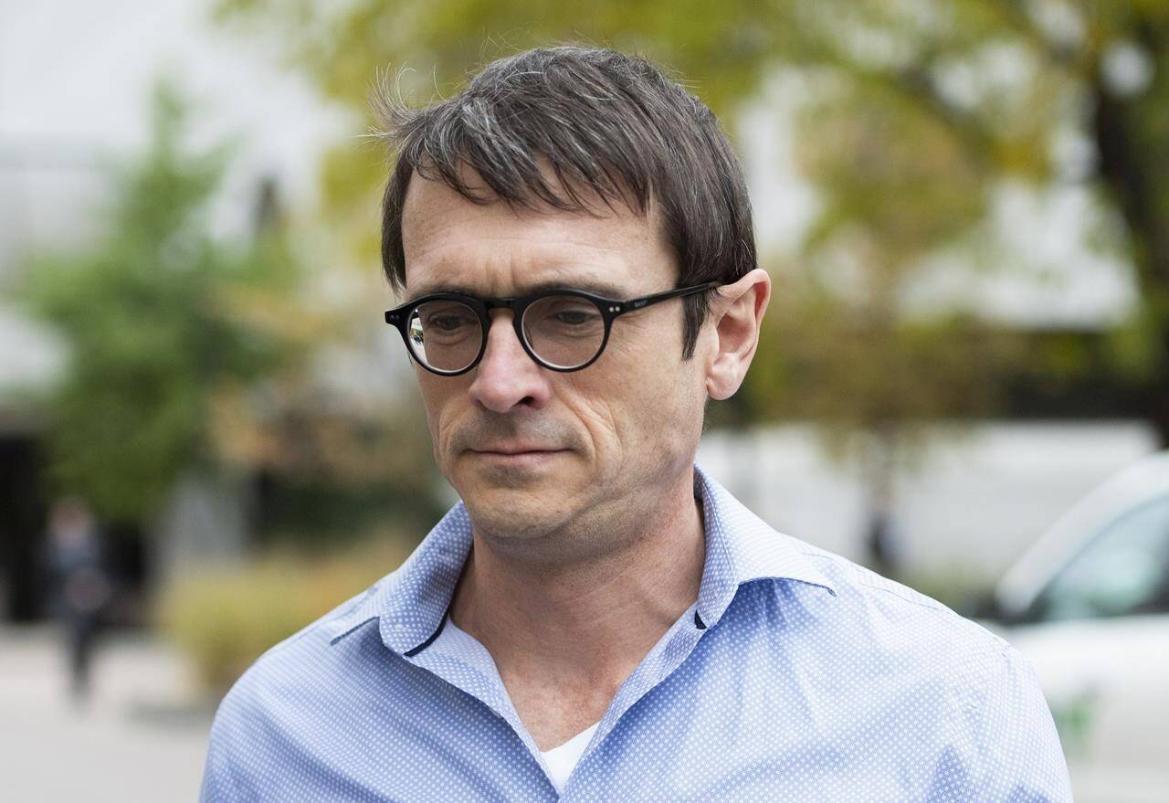 Cameron Ortis, a senior intelligence official at the RCMP, leaves the courthouse in Ottawa after being granted bail on October 22, 2019. THE CANADIAN PRESS/Justin Tang