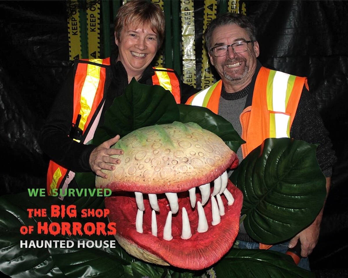 Daphne and Rick Swift have been hosting their Big Shop of Horrors at the Cowichan Exhibition Grounds since 2019. Before that they ran in out of their home. The Swifts pose with their mascot Seymour, the venus fly trap affectionately remembered from ‘The Little Shop of Horrors’ play and film. (Courtesy of Daphne Swift)