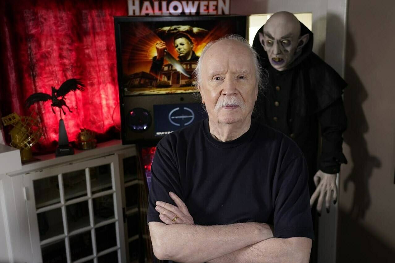 Director John Carpenter poses for a portrait at his office, Tuesday, Oct. 3, 2023, in Los Angeles. (AP Photo/Chris Pizzello)