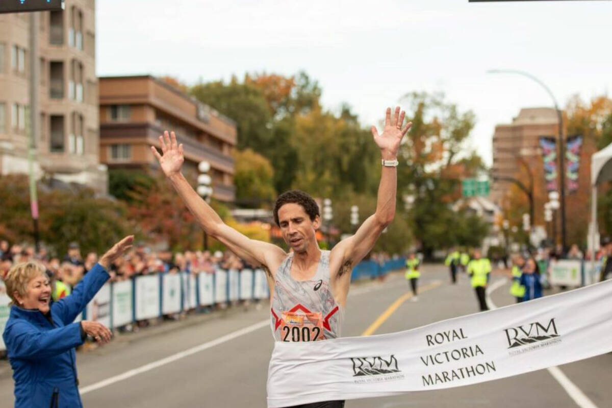 Black Creek runner Cam Levins crosses the Royal Victoria Half Marathon in record time on Sunday, Oct. 8. Photo by: Royal Victoria Marathon/Billie Design Co