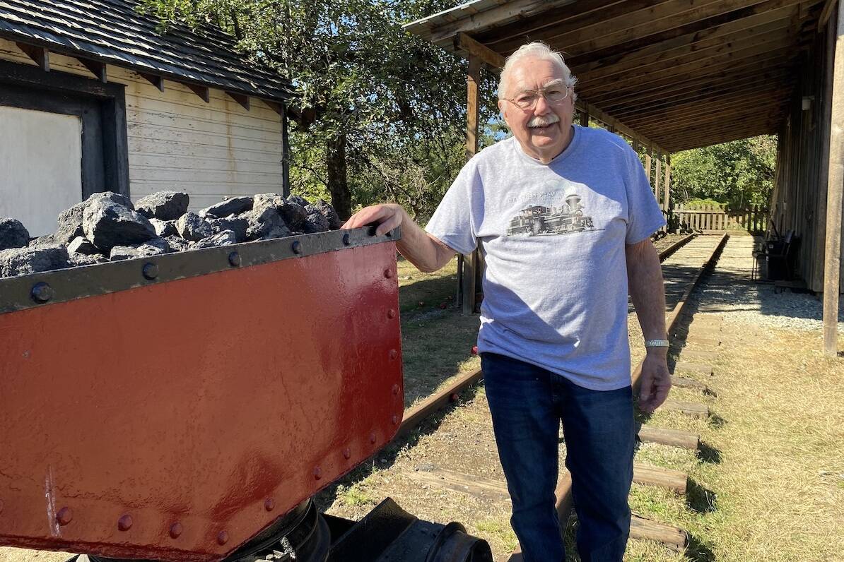 Ron Jeskey says he started building a train at the BC Forest Discovery Centre in reverse, starting with the little red metal dump car that originally came from Mount Sicker Mine. For the full story, see page 3. (Chadd Cawson/Citizen)