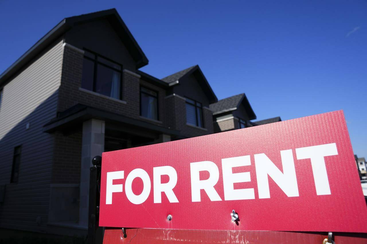 A for rent sign is displayed on a house in Ottawa on Friday, Oct. 14, 2022. THE CANADIAN PRESS/Sean Kilpatrick
