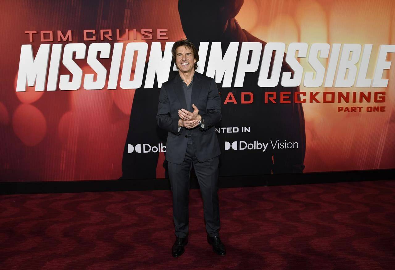 FILE - Tom Cruise attends the premiere of “Mission: Impossible, Dead Reckoning — Part One” at Jazz at Lincoln Center’s Frederick P. Rose Hall, July 10, 2023, in New York. On Monday, Oct. 23, Paramount Pictures shifted the release date of the eighth installment of the “Mission: Impossible” franchise, “Dead Reckoning — Part Two,” from June 28 next year to May 23, 2025, signaling a new wave of release-schedule juggling for Hollywood studios as the SAG-AFTRA strike surpasses three months of work stoppage. (Photo by Evan Agostini/Invision/AP, File)