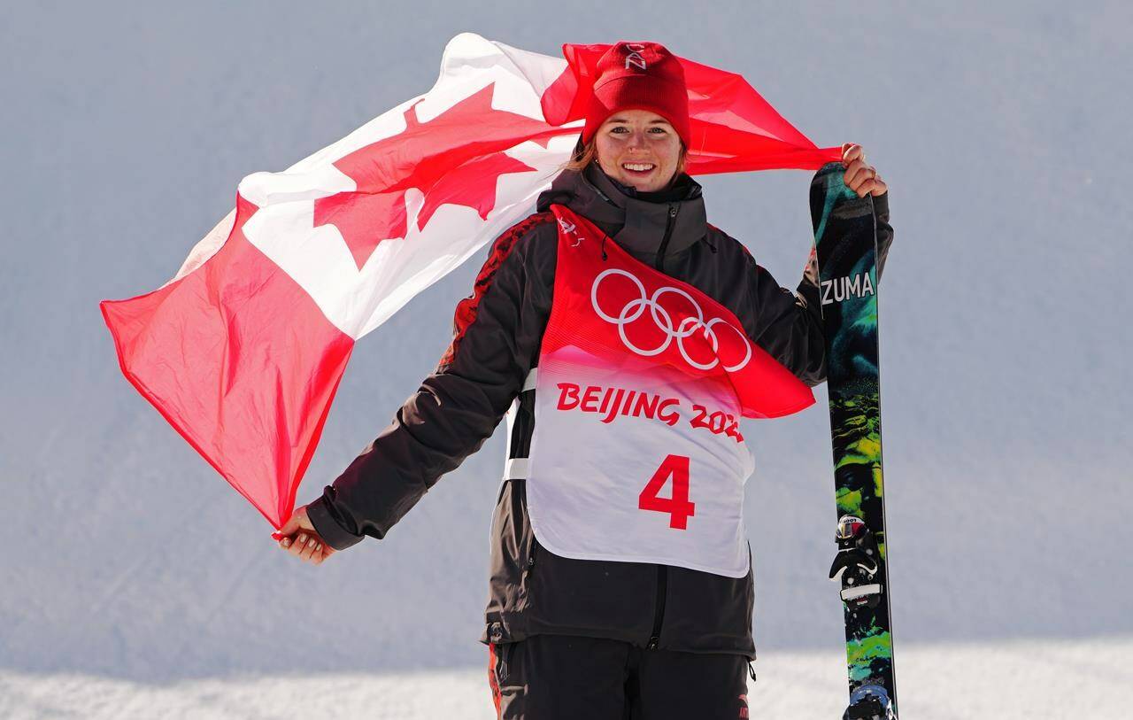 Canada’s Cassie Sharpe celebrates her silver medal in the freestyle women’s ski halfpipe final during the Beijing Winter Olympic Games, in Zhangjiakou, China, Friday, Feb. 18, 2022. THE CANADIAN PRESS/Sean Kilpatrick