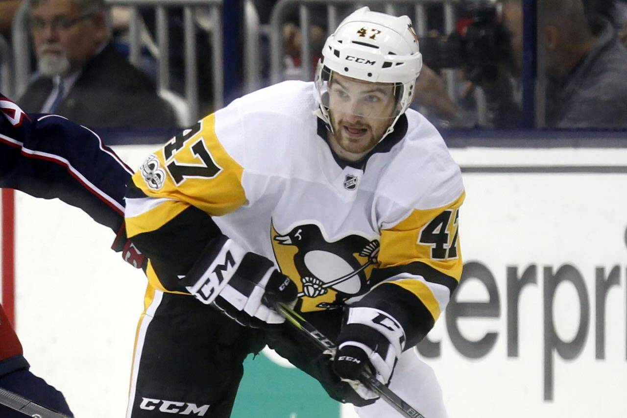 Pittsburgh Penguins forward Adam Johnson in action during an NHL hockey game in Columbus, Ohio, Friday, Sept. 22, 2017. American hockey player Adam Johnson has died after a “freak accident” during a game in England on Saturday, Oct. 28, 2023 his club said. The 29-year-old Minnesota native was playing for the Nottingham Panthers in a Challenge Cup game against the Sheffield Steelers when he suffered a slashed neck during the second period of the game at Sheffield’s Utilita Arena. (AP Photo/Paul Vernon, file)