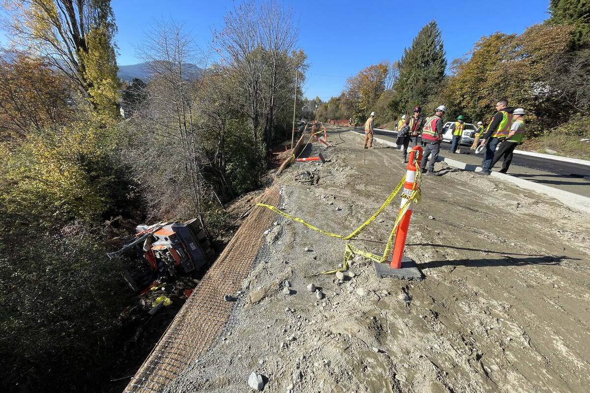 A machine operator was taken to hospital after a pavement compactor went over an embankment on Monday, Oct. 30. (Chris Bush/News Bulletin)