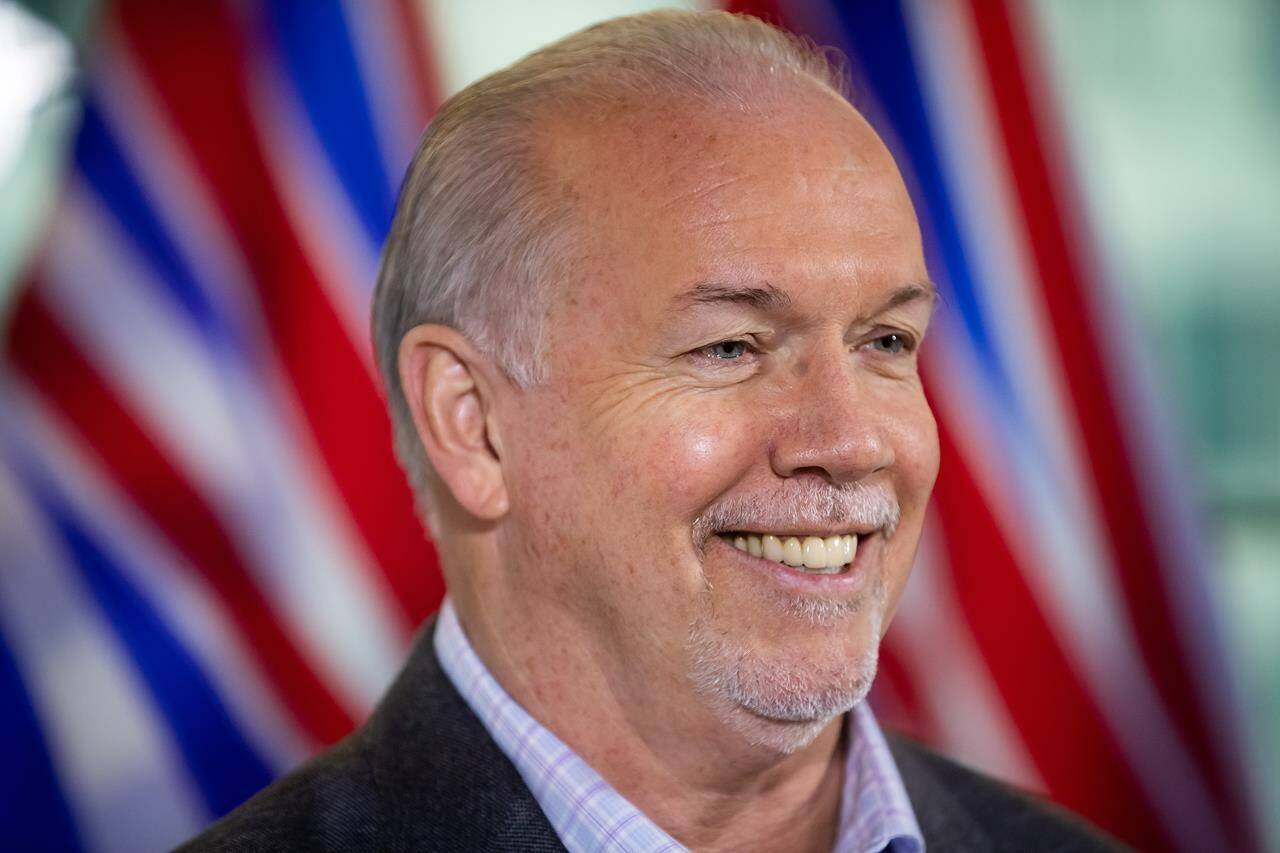 B.C. Premier-elect John Horgan smiles during a post-election news conference, in Vancouver, B.C., Sunday, Oct. 25, 2020 following his snap election in 2020. Democracy Watch, a non-profit organization advocating for democratic reforms, and Wayne Crookes, founder of IntegrityBC, a non-profit organization advocating for accountability, had argued that B.C.’s Court of Appeal that Horgan violated B.C. fixed-date election law. But the court dismissed the argument, confirming a lower court ruling. (THE CANADIAN PRESS/Darryl Dyck)