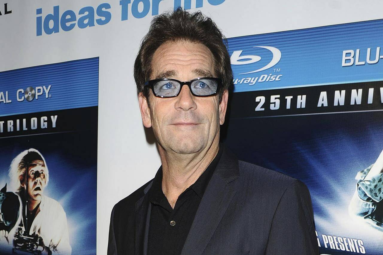 FILE - Musician Huey Lewis attends the “Back To The Future” 25th anniversary reunion in New York on Oct. 25, 2010. Lewis, who with his band The News stormed radio in the 1980s with such rock-pop hits as “The Power of Love” and “I Want a New Drug,” is about to take his music to a Broadway stage with “The Heart of Rock & Roll,” starting March 2024.(AP Photo/Peter Kramer)