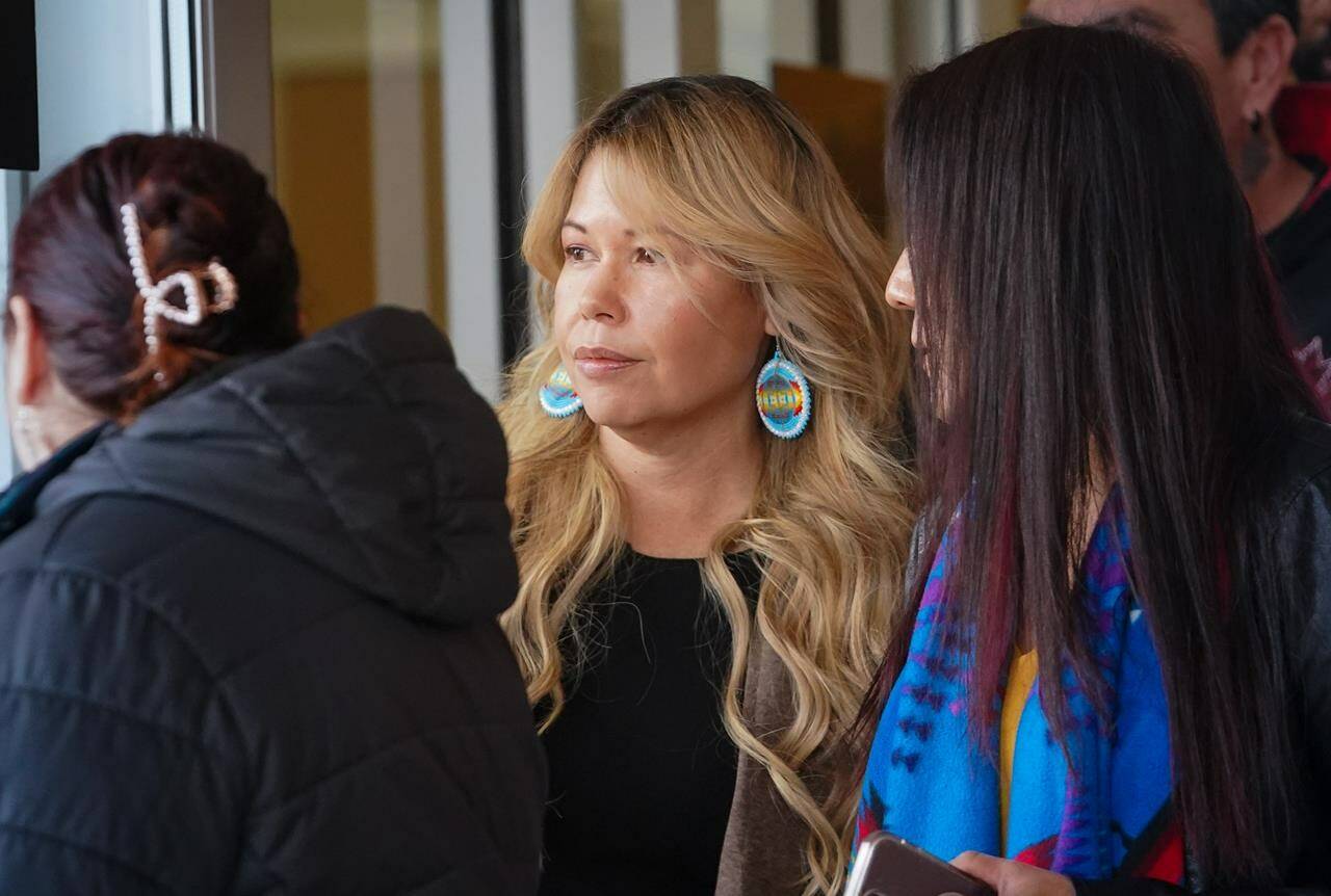 Dawn Walker walks out of provincial court after being sentenced in Saskatoon on Thursday, Nov. 2, 2023. THE CANADIAN PRESS/Heywood Yu