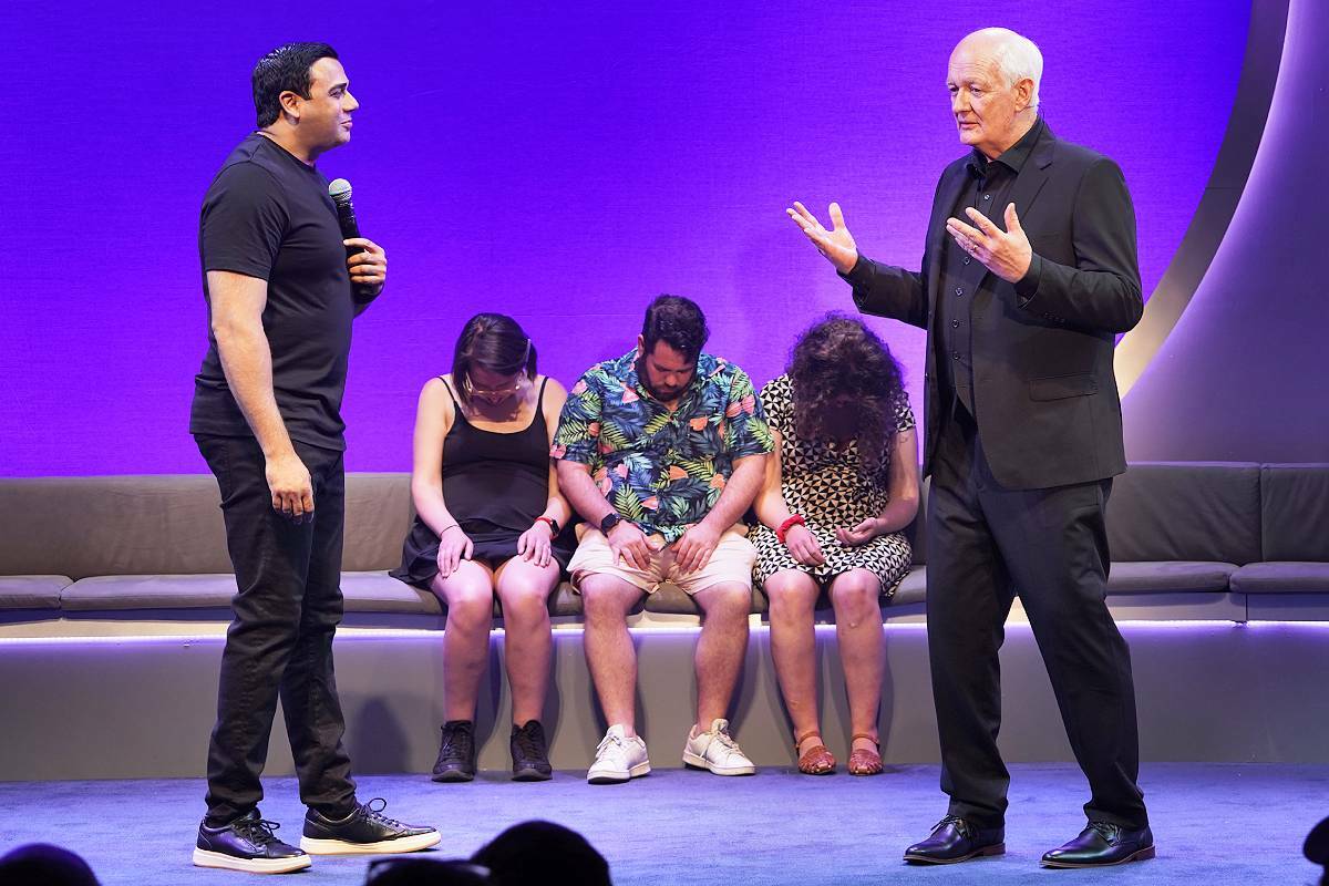 Hypnotist Asad Mecci, left, and comedian Colin Mochrie on stage with volunteers during a performance of ‘Hyprov: Improv Under Hypnosis.’ The pair will bring the show to Nanaimo’s Port Theatre Nov. 8. (Photo by Carol Rosegg)