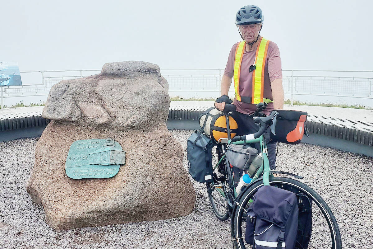 Former Cobble Hill resident Charles Klasen who now resides in Brentwood Bay poses with his Marin Tour bike at Cape Spear, Newfoundland the most eastern point in Canada. Klasen who left his Brentwood Bay home on May 25, completed his 7, 132 km journey to Cape Spear on Aug. 21. (Courtesy of Charles Klasen)