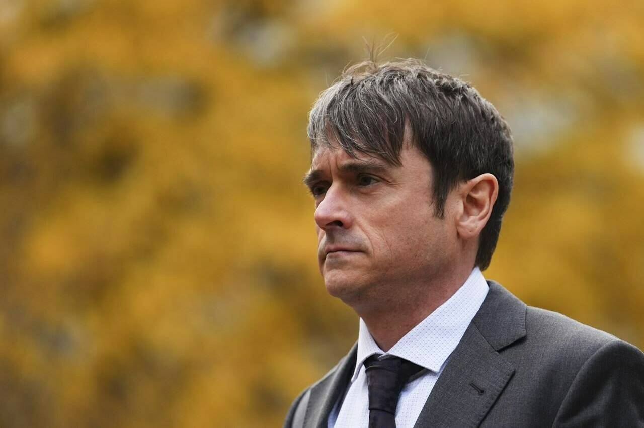 A former RCMP intelligence official accused of leaking secrets has told a jury he didn’t commit a crime or betray the national police force. Cameron Jay Ortis arrives to the Ottawa Courthouse in Ottawa on Friday, Nov. 3, 2023. THE CANADIAN PRESS/Sean Kilpatrick