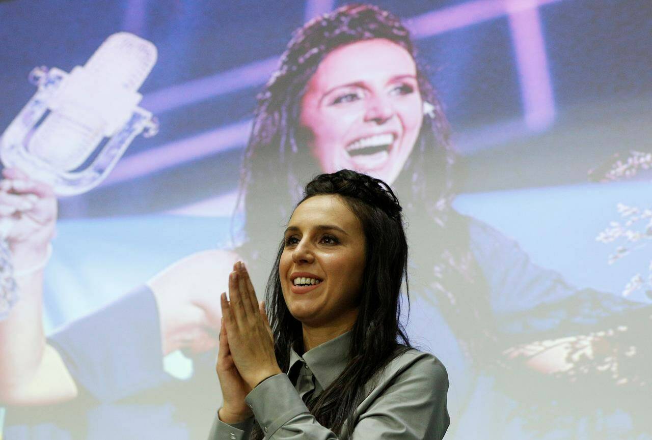 FILE - Ukraine’s Eurovision singer Jamala speaks during a news conference about her winning song “1944” in Kyiv, Ukraine, Tuesday, May 17, 2016. Russia has placed a Ukrainian singer who won the 2016 Eurovision Song Contest on its wanted list, state news agencies reported Monday, Nov. 20, 2023. The reports said an Interior Ministry database listed singer Susana Jamaladinova as being sought for violating a criminal law. The independent news site Mediazona, which covers opposition and human rights issues, said Jamaladinova was charged under a law adopted last year that bans spreading so-called fake information about the Russian military and the ongoing fighting in Ukraine. (AP Photo/Sergei Chuzavkov, File)