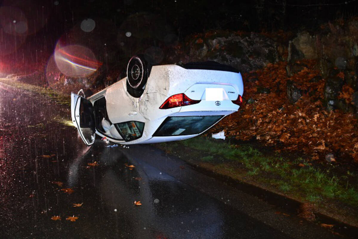 A white Toyota Corolla is seen flipped onto its roof on Nov. 18. The driver was over the legal limit and was suspended from driving for 90 days. (Photo Submitted)