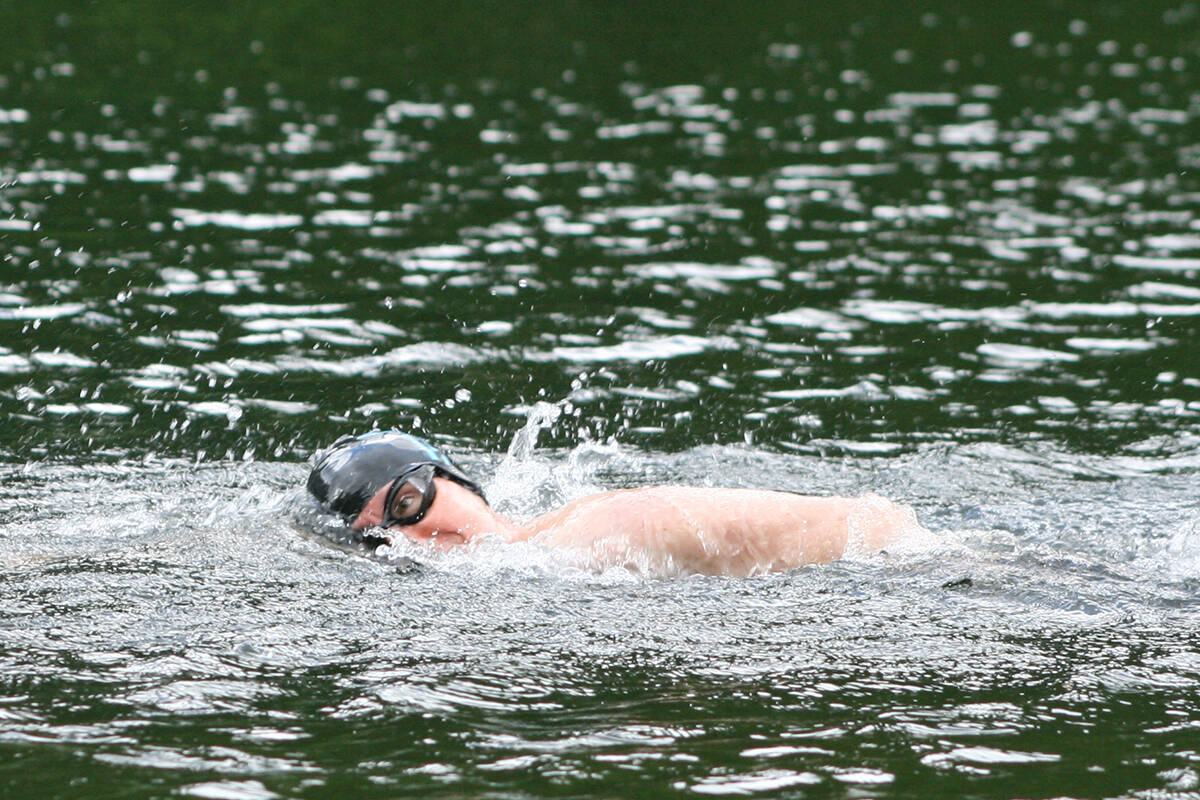 Durrance Lake in Saanich is a popular place in the summer for recreation. This file photo shows someone previously swimming in the lake. (Black Press Media file photo)