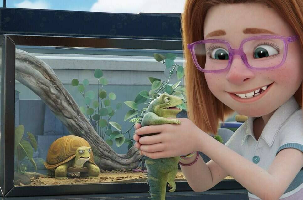 This image released by Netflix shows Leo, a 74-year-old lizard voiced by Adam Sandler, center, being held by Summer, voiced by Sunny Sandler, as Squirtle the turtle, voiced by Bill Burr, looks on at left, in a scene from “Leo.” (Netflix via AP)