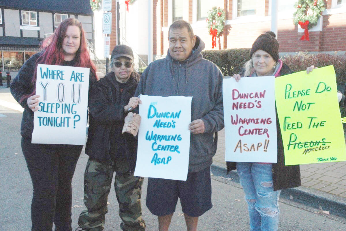 Several advocates for the homeless took to the streets at Duncan’s Christmas Kick Off on Nov. 24 to inform the public that the region has yet to establish an extreme weather emergency shelter or warming centres this winter. Among those spreading awareness are Sarah McKenna, Linda Williams and Sandy King. (Robert Barron/Citizen)
