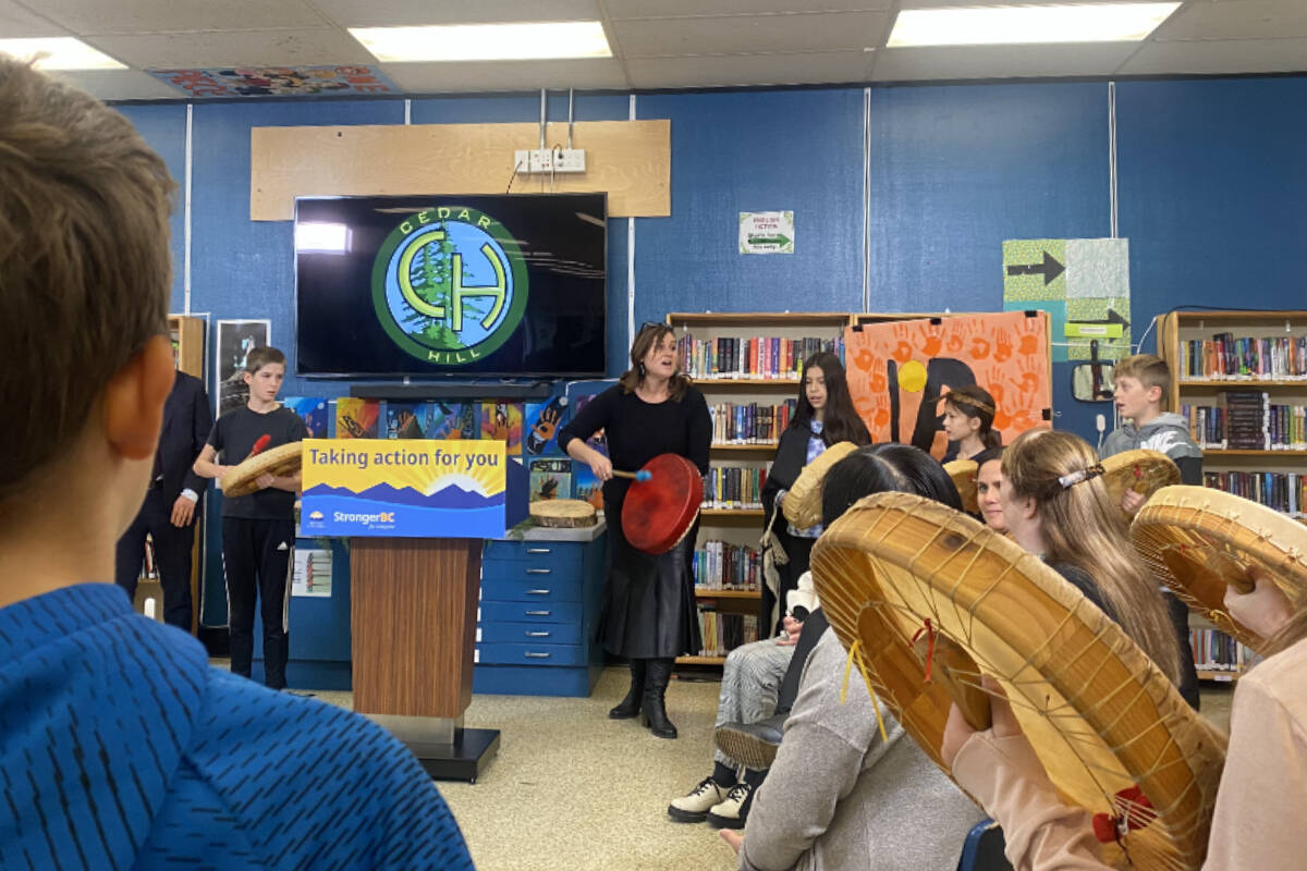 Drum leader and teacher at Cedar Hill Middle School, Tasha Henry, leads the first cohort of Grade 8 students who will attend the soon-to-be-redeveloped Cedar Hill Middle School in a drum cycle. (Ella Matte/News Staff)