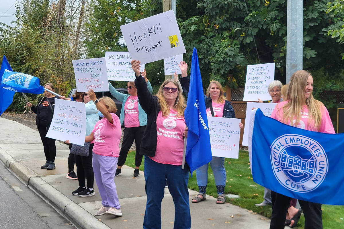 Hospital Employees Union members from Vernon’s Heron Grove hosted a two-hour rally outside the facility Wednesday, Sept. 27. Staff at Heron Grove and six other facilities owned and operated by the Good Samaritan Canada Society have now ratified a new five-year collective bargaining agreement. (Roger Knox - Black Press)
