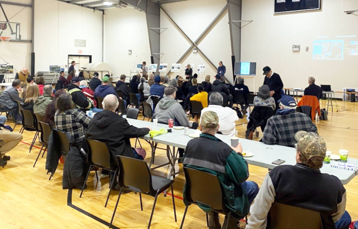 An information session at the Halalt gymnasium Monday drew a sizable crowd considering nasty weather outside. (Photo by Rob Douglas)