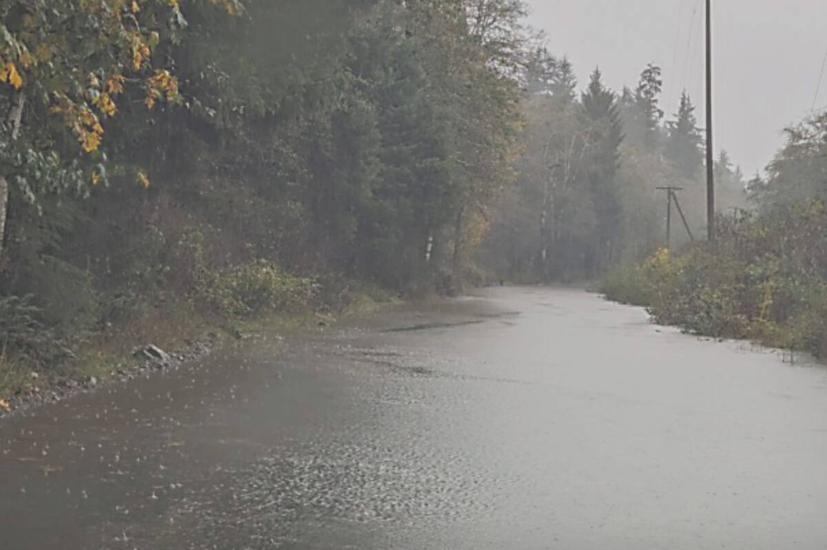 By mid October the road to Nitinat Lake was flooded by heavy rain (pictured), but the atmospheric river event in early December is heightening the need for a better land passage to the community. (Brian Tate photo)