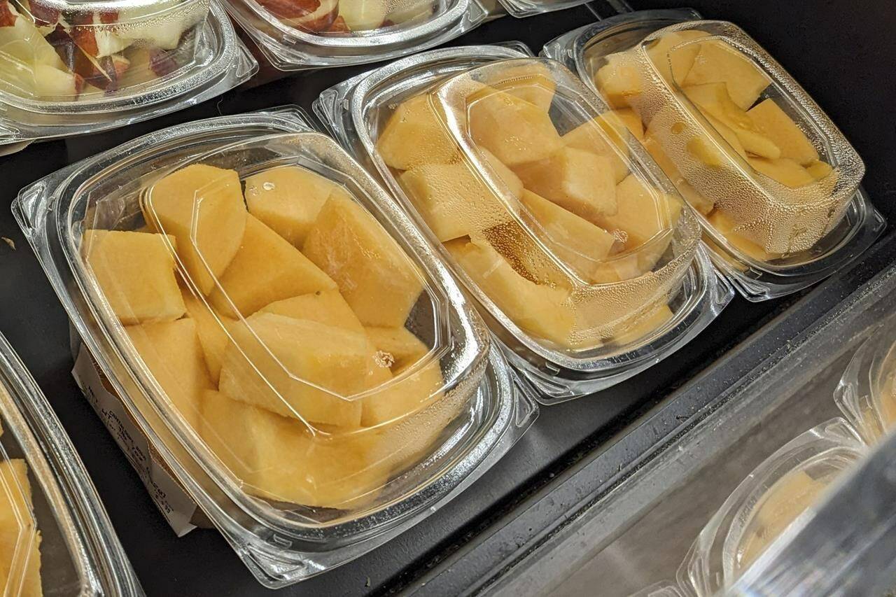 Cut cantaloupe is displayed for sale at a supermarket in Philadelphia on Sunday, Dec. 3, 2023. On Thursday, Dec. 7, 2023, U.S. and Canadian officials reported additional deaths in a salmonella outbreak tied to tainted cantaloupe. (AP Photo/Jonathan Poet)