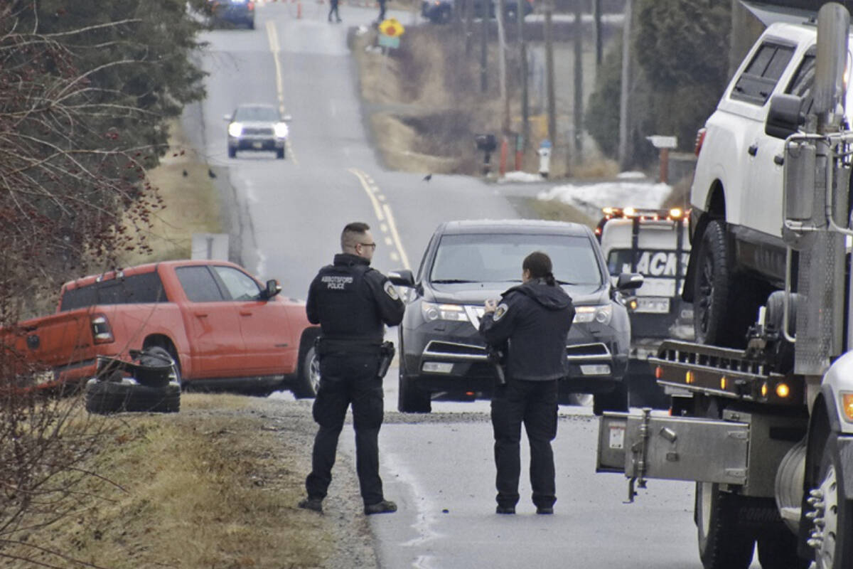 Police were on Lefeuvre Road in Abbotsford on Dec. 11, 2022 after Marc Ellis was hit and killed by a red Dodge Ram pickup truck that was left behind. (Shane MacKichan photo)
