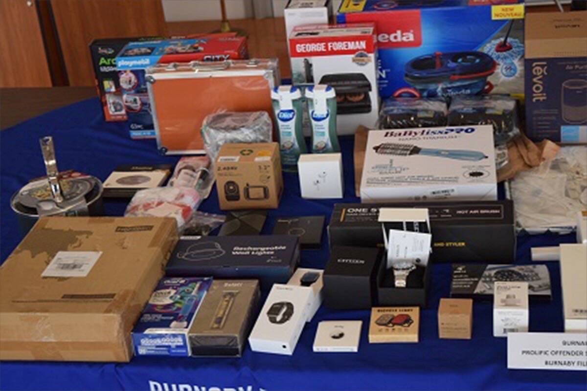 Some of the items the Burnaby RCMP recovered, related to package thefts. A Surrey man was one of three arrested. (RCMP photo)