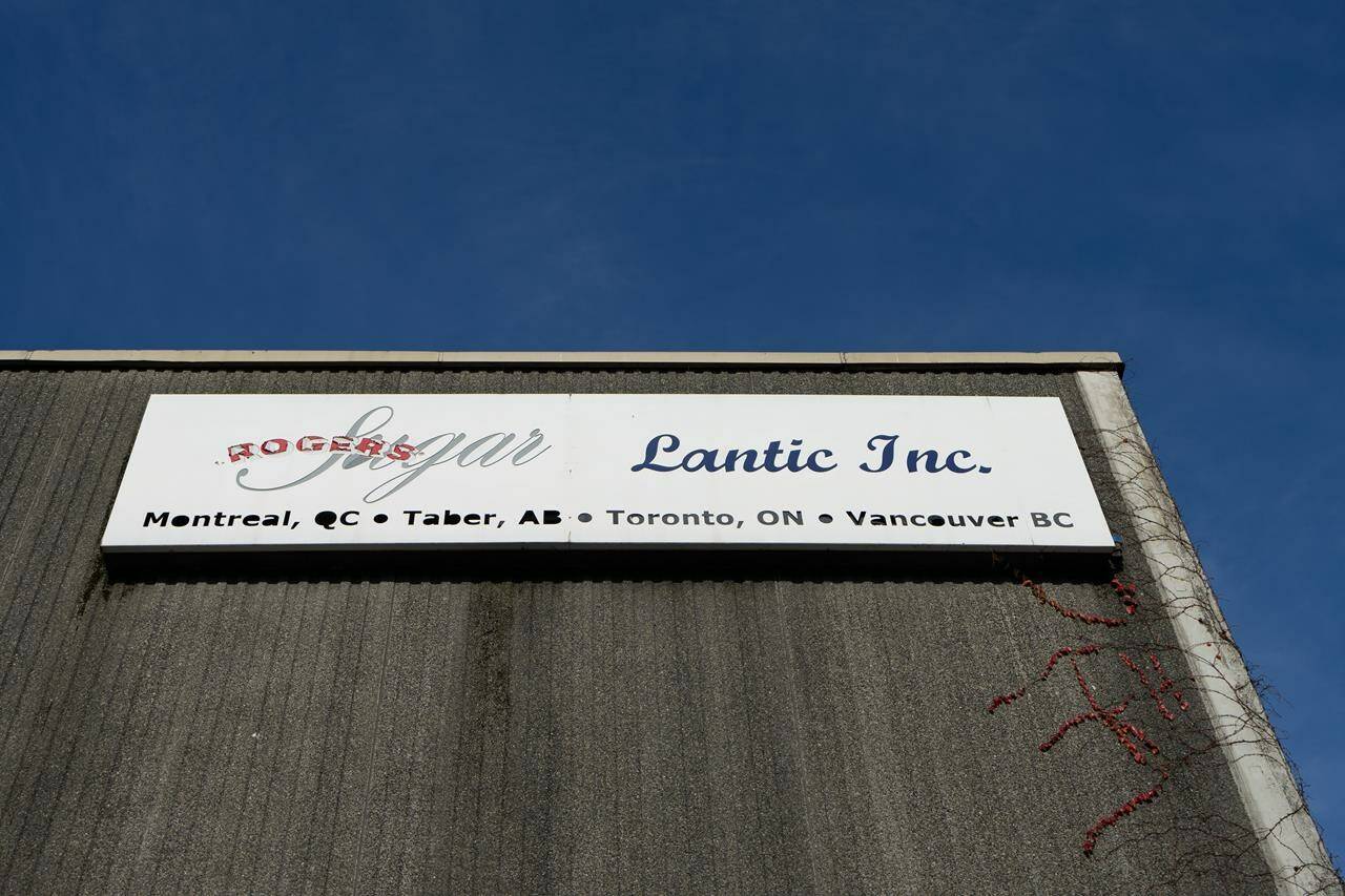 The Rogers Sugar and Lantic sign is shown outside of the Rogers sugar refinery in Vancouver, on Thursday, Nov. 16, 2023. Rogers Sugar Inc. says it is pausing negotiations after the union representing striking workers at its Vancouver refinery rejected the company’s latest offer. THE CANADIAN PRESS/Ethan Cairns