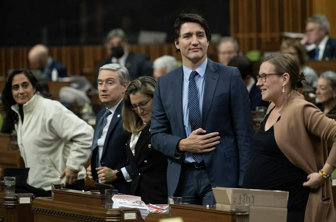Prime Minister Justin Trudeau rises to vote during an overnight session in the House of Commons, Friday, December 8, 2023 in Ottawa. Trudeau’s birthday is Dec. 25. In which year was he born? THE CANADIAN PRESS/Adrian Wyld