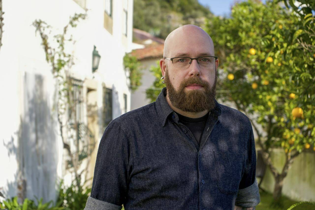 David Thiel, chief technologist at the Stanford Internet Observatory and author of its report that discovered images of child sexual abuse in the data used to train artificial intelligence image generators, poses for a photo on Wednesday, Dec. 20, 2023, in Obidos, Portugal. Pictures of Canadian victims are among the thousands of images. THE CANADIAN PRESS/Camilla Mendes dos Santos via AP