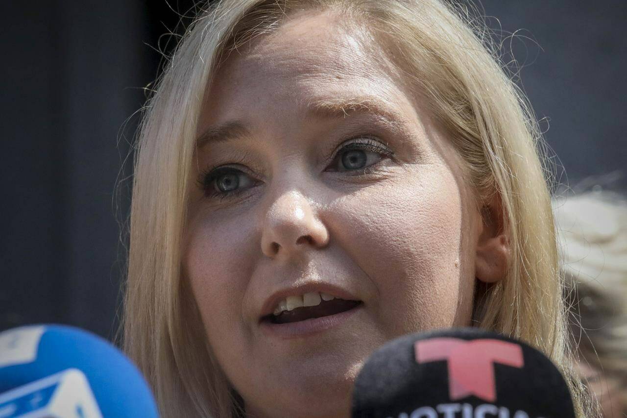 FILE - Virginia Roberts Giuffre, a sexual assault victim, speaks in New York, July 2, 2020. Social media is abuzz with news that a judge is about to release a list of “clients,” or “associates” or maybe “co-conspirators,” of Jeffrey Epstein, the jet-setting financier who killed himself in 2019 while awaiting trial on sex trafficking charges. While some previously sealed court records are indeed being made public, the great majority of the people whose names appear in those documents are not accused of any wrongdoing. (AP Photo/Bebeto Matthews, File)