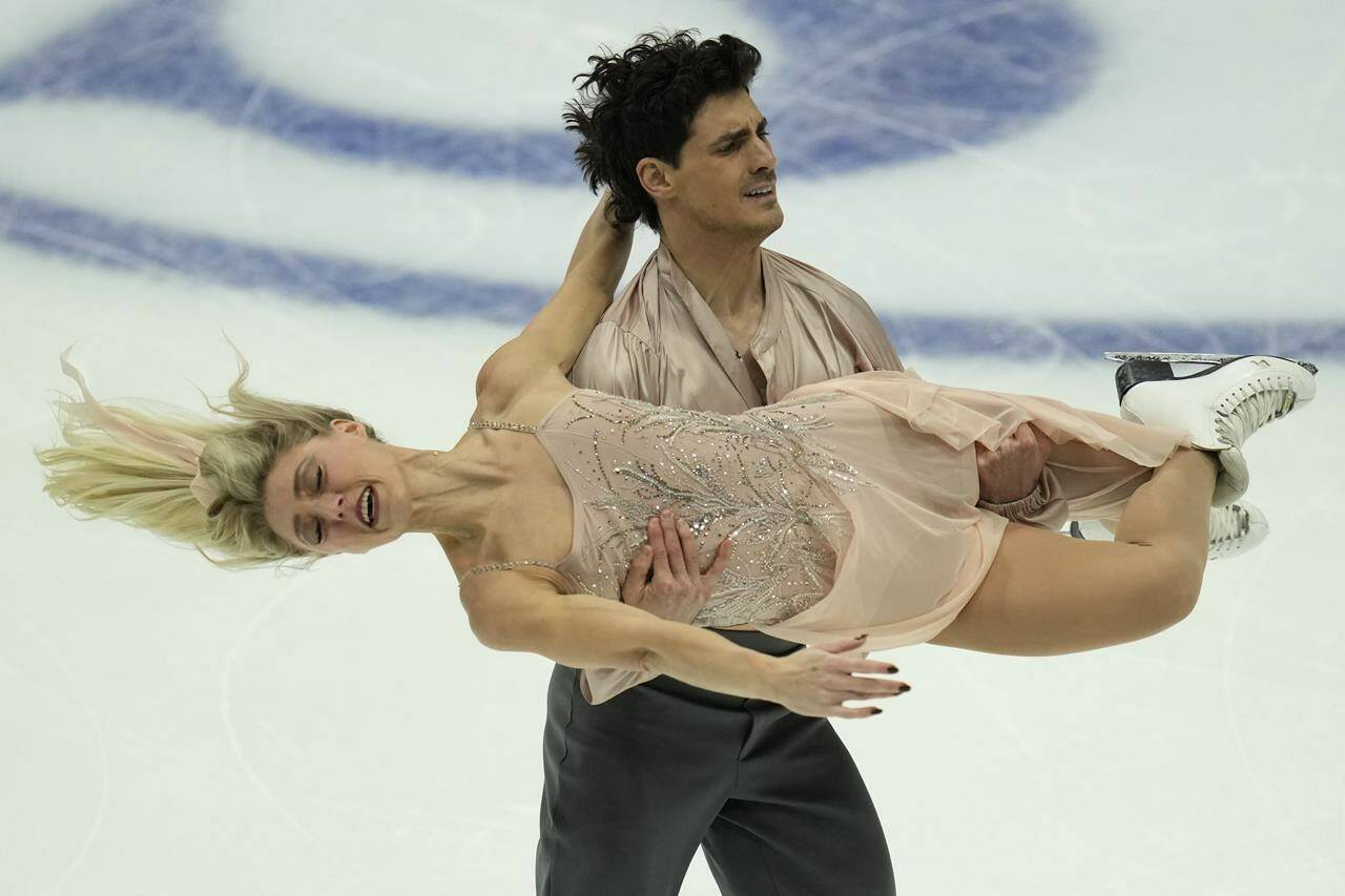 Bronze medallists Canada’s Piper Gilles and Paul Poirier compete in the Ice Dance Final for the ISU Grand Prix of Figure Skating Final held in Beijing, Saturday, Dec. 9, 2023. The 2024 Canadian figure skating championship will feel like a return to normal for the ice dance duo of Gilles and Poirier. The two-time world championship bronze medallists didn’t compete in last year’s nationals because Gilles underwent surgery for ovarian cancer. THE CANADIAN PRESS/AP-Ng Han Guan
