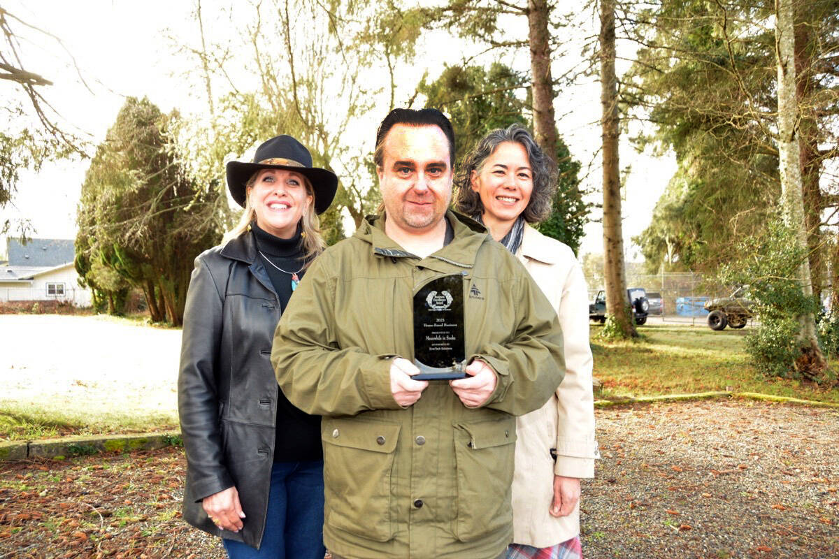 Benjamin Kendrick, shown here in a 2017 photo with Sooke Mayor Maja Tait and Sooke Region Chamber of Commerce past president Karen Mason, is stepping away from Meanwhile in Sooke. (File - Sooke News Mirror)