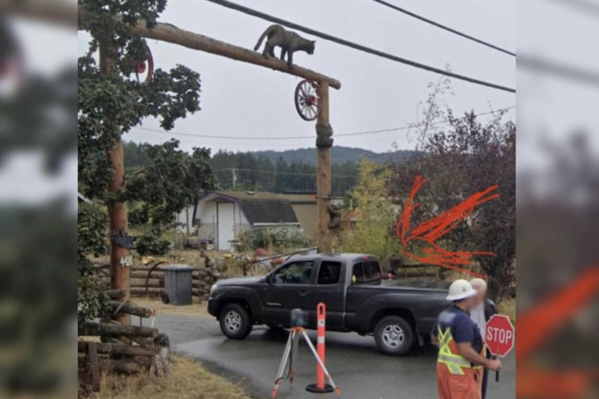 Rod Rimmer and his family’s $5,000 wooden bear sculpture was stolen off his property on Christmas day. (Courtesy of Dallas Rimmer on Facebook)