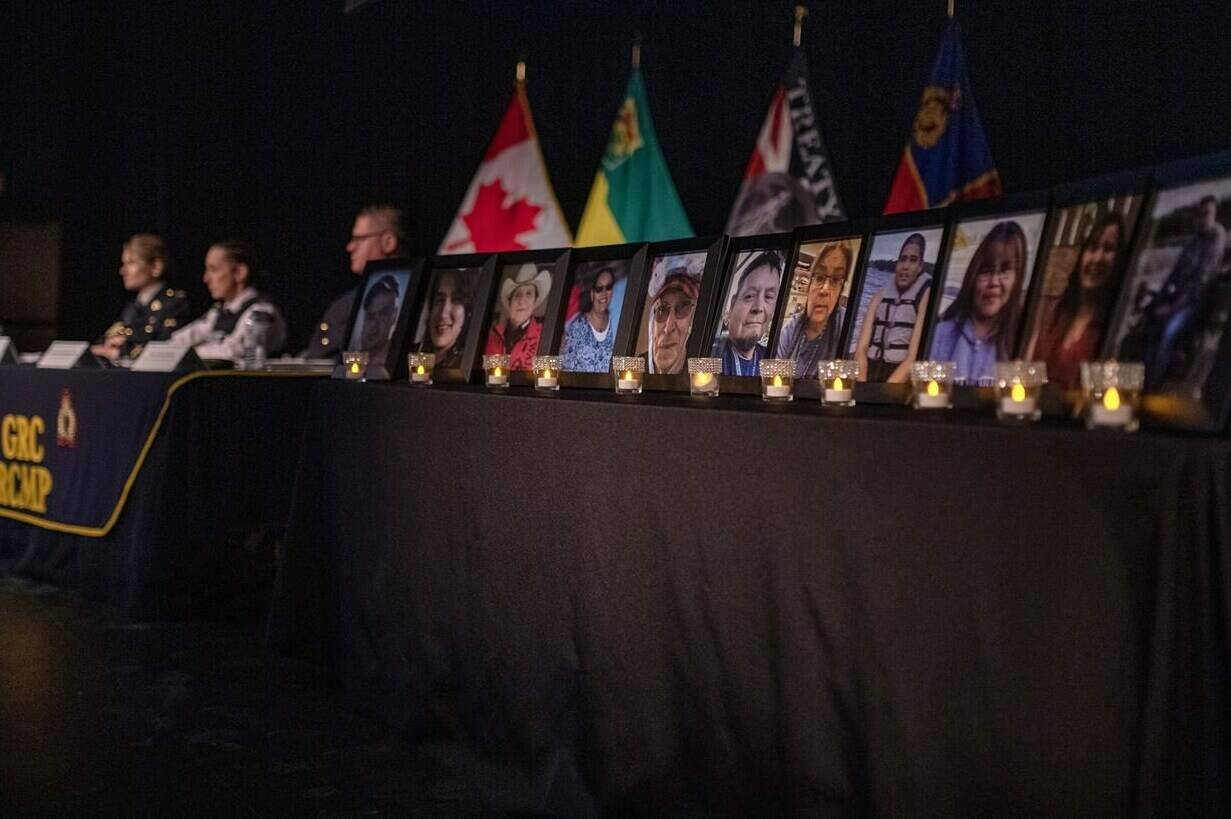 Photographs of those killed during the mass stabbing on the James Smith Cree Nation and in the nearby village of Weldon in 2022 are on display as Saskatchewan RCMP provide a preliminary timeline presentation of the events during a media event in Melfort, Sask., on Thursday, April 27, 2023. THE CANADIAN PRESS/Liam Richards