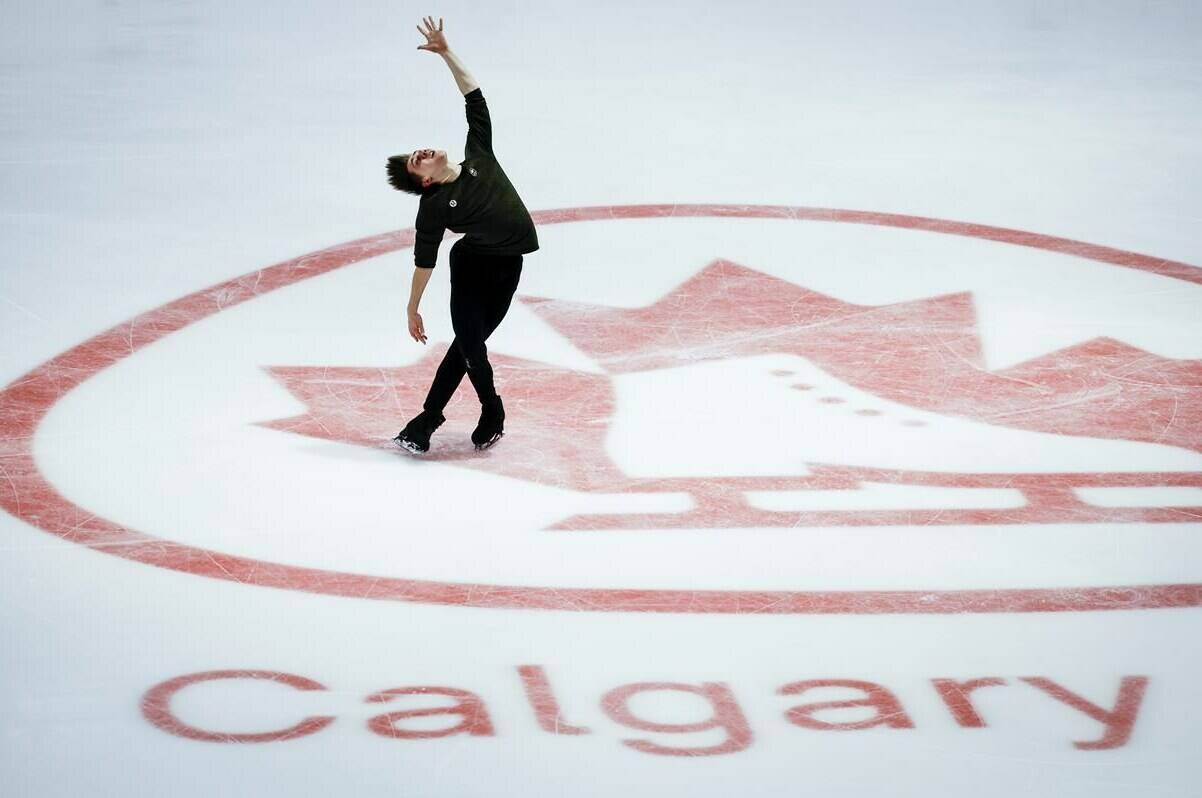Roman Sadovsky, of Ontario, skates during a practice session at the Canadian figure skating championships in Calgary, Thursday, Jan. 11, 2024. Roman Sadovsky says he’s been greeted with “you made it” and “you have skates” at the Canadian figure skating championships in Calgary. THE CANADIAN PRESS/Jeff McIntosh