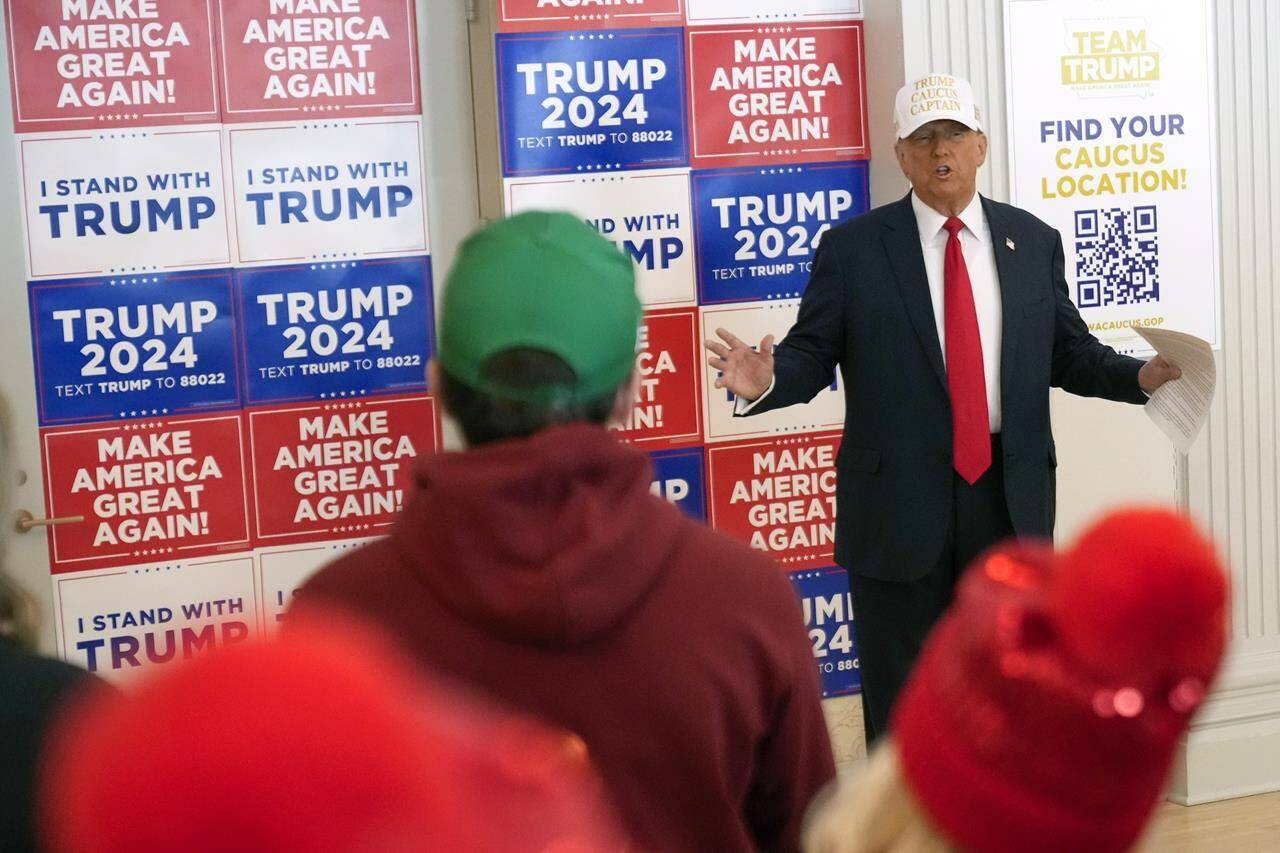 Republican presidential candidate former President Donald Trump speaks to volunteers at Hotel Fort Des Moines in Des Moines, Iowa, Sunday, Jan. 14, 2024. (AP Photo/Andrew Harnik)