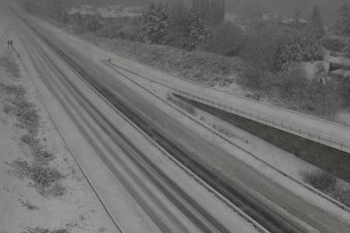 McTavish Road, looking north, at Highway 17 on Wednesday morning (Jan. 17, 2024). The region’s first major snowfall of the year has led to some delays and cancellations at Victoria International Airport. (DriveBC)