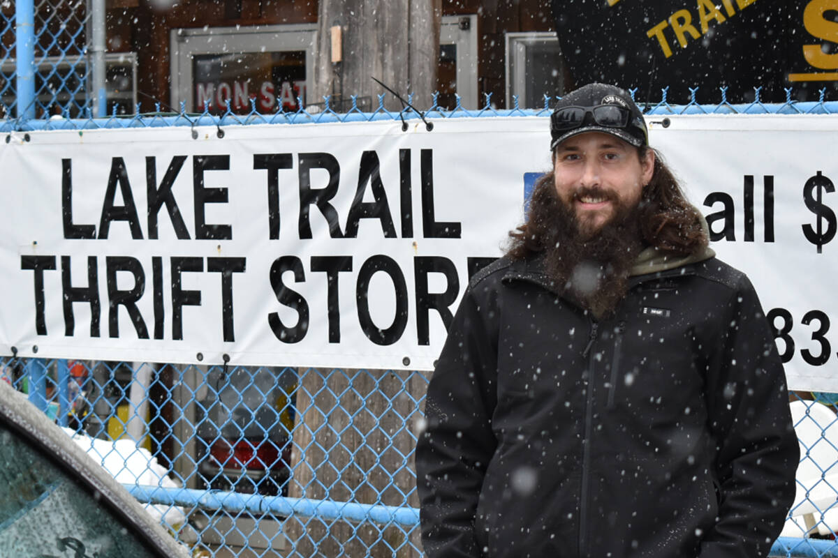 Lake Trail Thrift Store owner Mathew Townsend stands in front of his store. On Thursday morning, he put out a call for immediate help to keep the shop open. (Connor McDowell/Comox Valley Record)